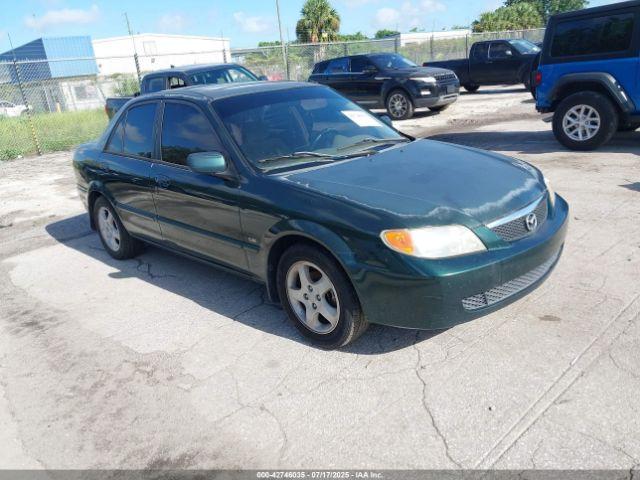  Salvage Mazda Protege